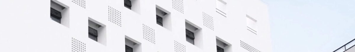 facade-of-a-white-building-2023-11-27-04-53-04-utc.jpg